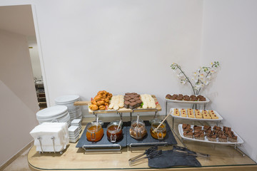 Dessert buffet table in small hotel