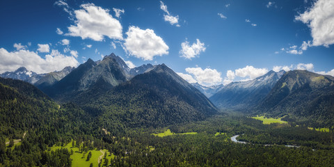 Panoramic nature mountains landscape in the summer day. Aerial drone view from above