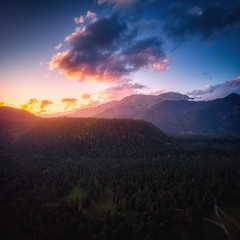 Panoramic nature mountains landscape in the sunset. Aerial drone view from above