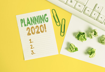 Conceptual hand writing showing Planning 2020. Concept meaning process of making plans for...