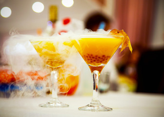 cocktail with liquid nitrogen, yellow Martini