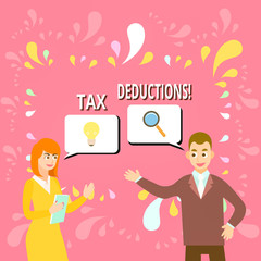 Writing note showing Tax Deductions. Business concept for reduction income that is able to be taxed of expenses Business Partners Colleague Jointly Seeking Problem Solution