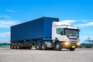 Truck transportation,import,export logistic industrial with beautiful sky and shipyard...