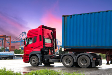 Truck transportation,import,export logistic industrial with beautiful sky and shipyard background,Thailand