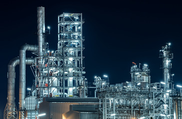 Industrial view oil and gas refinery,Detail of equipment oil pipeline steel at night background