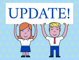 Fototapeta na wymiar Text sign showing UPDATE. Business photo text make something more modern or up to date like software program Two Smiling People Holding Big Blank Poster Board Overhead with Both Hands