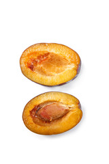 fresh blue plums on a white background