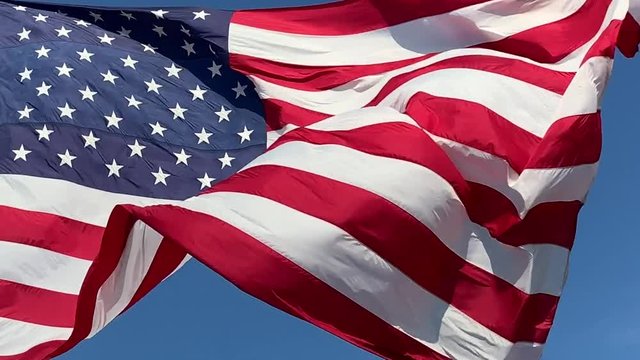 Closeup of American Flag waving in the wind.