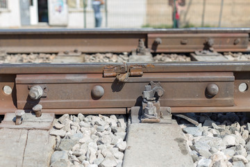 Old railway line. Connecting metal railway rails.