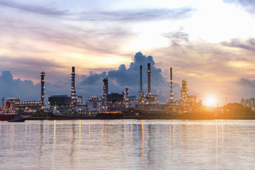 Close up view Refinery tower in petrochemical industrial plant with cloudy sky at the Chaophaya river in Bangkok Thailand