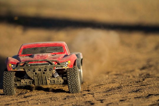 Rc Car Going Fast Through The Dirt