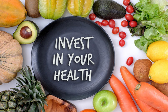 Invest in your health , Healthy lifestyle concept with diet and fitness , Get fit in  , fitness equipment and healthy food