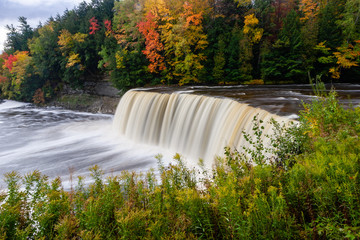 Side view of Tahquamenon Falls in the Upper Peninsula of Michigan in Autumn
