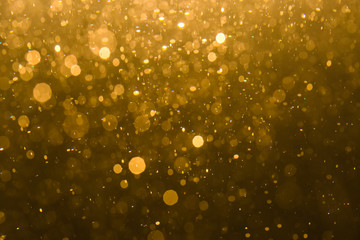 Abstract gold bokeh with black