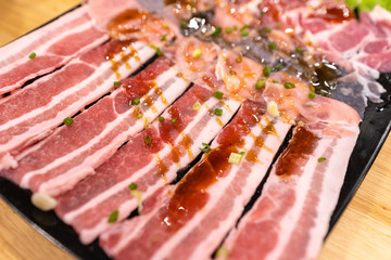 fresh raw pork slide with sauce in restaurant