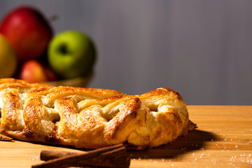Rolled apple pie, homemade pie, white background