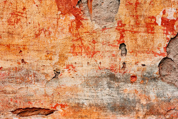 Texture of a concrete wall with cracks and scratches which can be used as a background