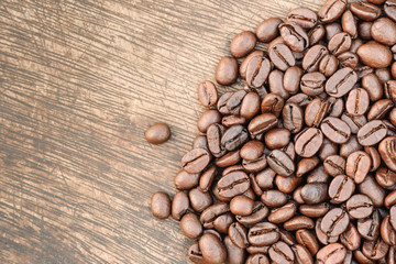 Roasted coffee beans on  table and copy space