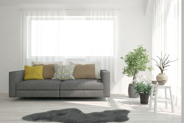 Fototapeta premium Stylish room in white color with sofa. Scandinavian interior design. 3D illustration