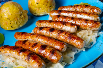 thuringian bratwurst with sauerkraut and dumplings