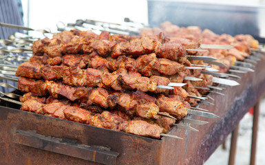 Barbecue skewers grilled on charcoal