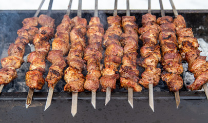 Barbecue skewers grilled on charcoal