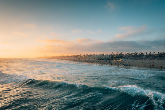 Sunset over the beach from the pier in Huntington Beach, Orange County, California