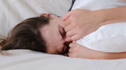 Desperate lady suffering anxiety attack at sitting alone at home, feeling helpless, heartbroken frustrated lonely girl having psychological trauma problem troubled with pregnancy