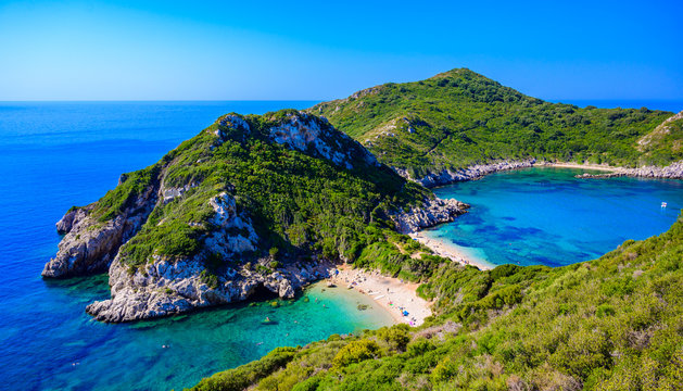 Porto Timoni beach at Afionas is a paradise double beach with crystal clear azure water in Corfu, Ionian island, Greece, Europe