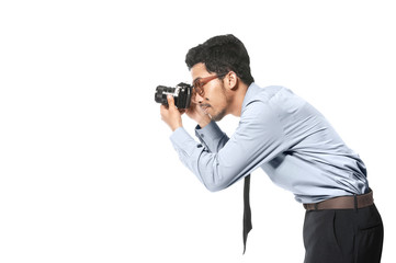 Asian businessman take a picture with his camera