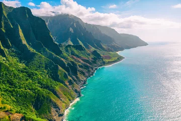 Foto auf Acrylglas Hawaii Kauai lansdcape aerial view from the air helicopter flight. Amazing dramatic Na Pali coast of hawaiian island mountains, USA summer travel. © Maridav