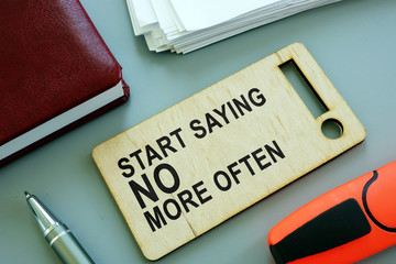 Start Saying No More Often sign on the plate.