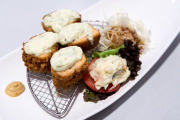 Fried Salmon with cream sauce (Japanese food).