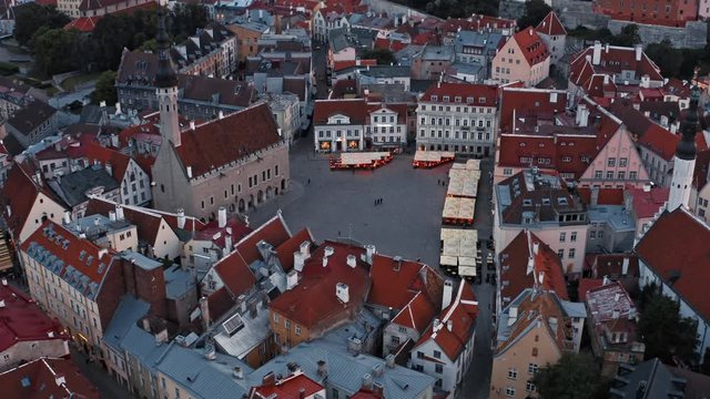 Tallinn, Estonia: evening drone view of Tallinn Town Hall with Town Hall Square in old town