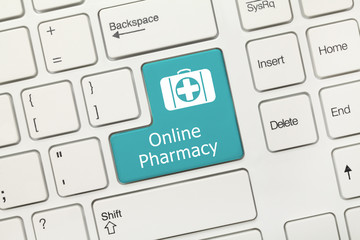 White conceptual keyboard - Online Pharmacy (blue key)