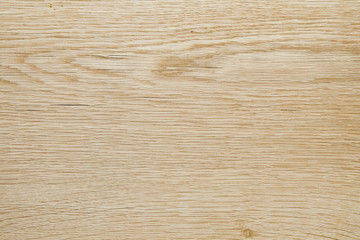 Natural light oak wood texture for background and design. Close-up.
