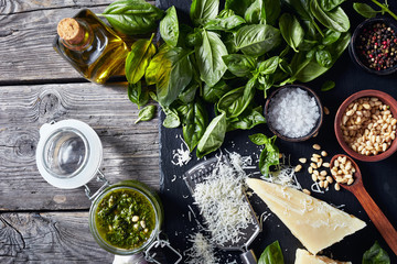 Basil pesto sauce in a glass jar