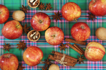 Bright ripe apples forming autumn mood background for design and decoration