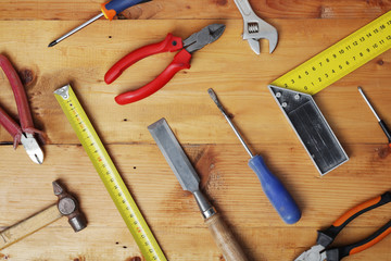 Working tools on wooden rustic background	