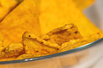 Background of triangular nachos on the plate