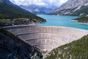 Obraz na płótnie Canvas Hydroelectric power plant in the alps - Dam