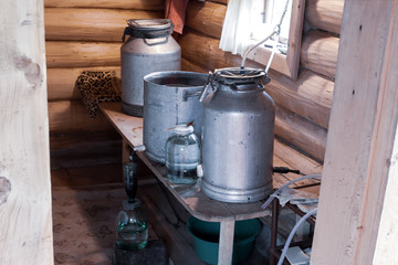 The process of preparing moonshine in a village bath in a primitive moonshine distilling-apparatus....
