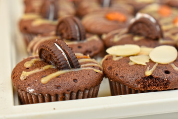  The bakery has bread and chocolate. Many many kinds We can choose to buy easily.