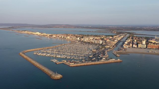 aerial view of the city of Palavas-les_flots sunrise marina yacht harbor canal le Lez river Occitanie Herault