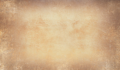 Grunge texture of old vintage paper. Beautiful textured background in brown tones.