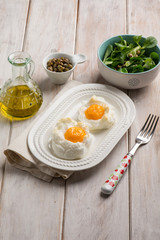 owen eggs eith salad capers and olive oil