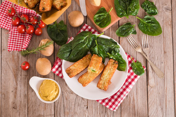 Potato croquettes with spinach and mozzarella. 