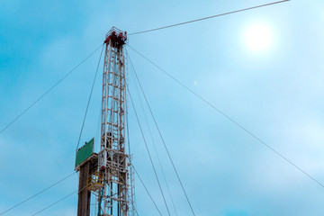 Fototapeta premium Oil and Gas Drilling Rig. Oil drilling rig operation on the oil platform in oil and gas industry. Petroleum Industry.