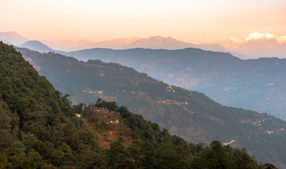 A view of Snow clad Kangchenjunga, also spelled Kanchenjunga, is the third highest mountain in the world. It lies between Nepal and Sikkim, India,  