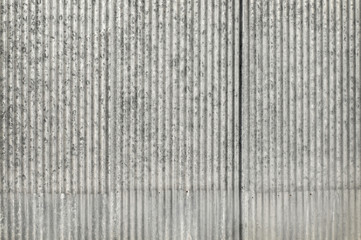 Old gray zinc plate fence wall texture background, pattern of galvanized metal panel sheeting.